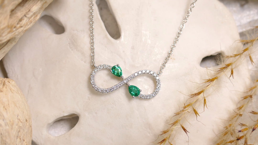 14k White Gold Emerald Accents 0.29ct Infinity .17ct Diamond