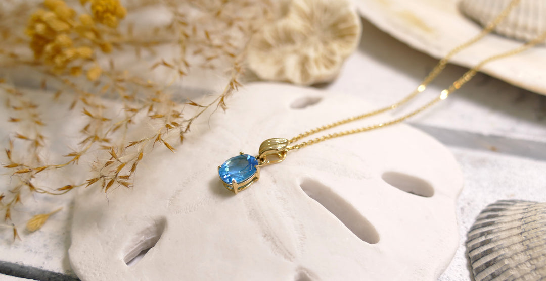 14k Yellow Gold 1.5ct Blue Topaz Oval Pendant
