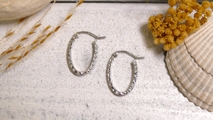 14k White Gold Flat Oval + Diamond Cut Small Hoop Earrings