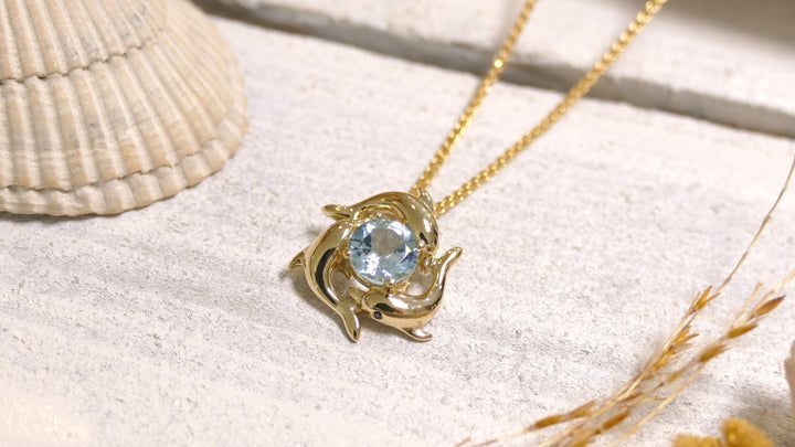 14k - Yellow Gold Triple Dolphin Blue Topaz Pendant