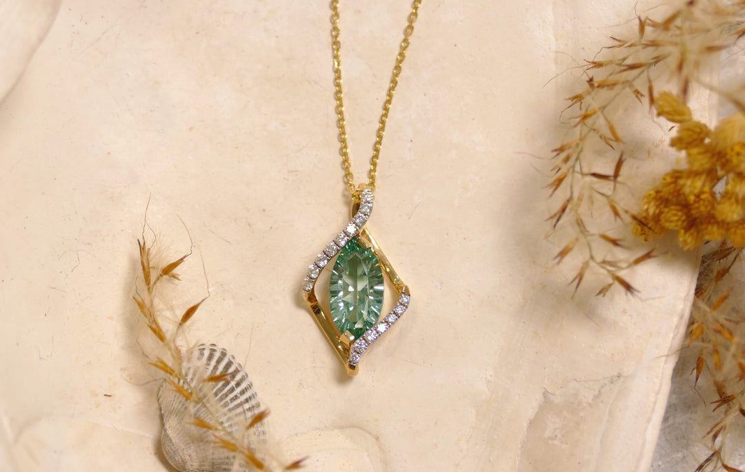 14k Yellow Gold 0.15ct Accent Diamonds Caribbean Topaz Marquise Pendant