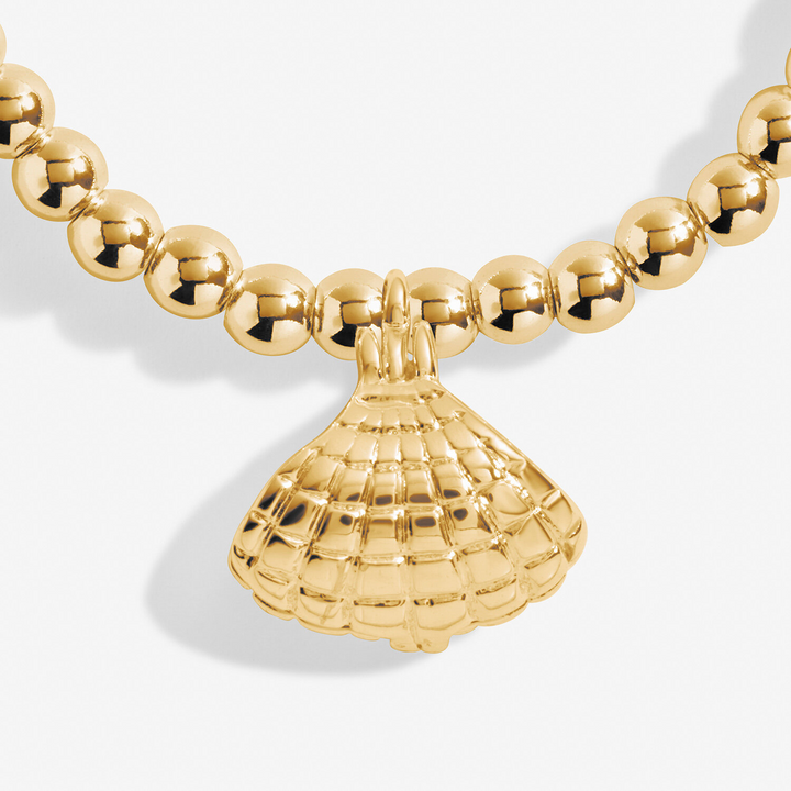 A Little & Co - Brass - Gold - World Is Your Oyster - Stretch Beaded Bracelet 6 7/8"