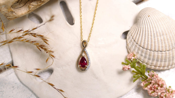 14k Yellow Gold 0.05CT Ruby Pear Pendant 18"