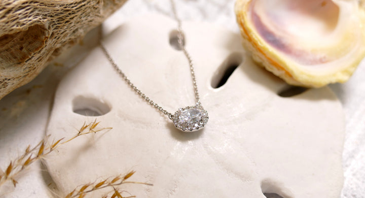 14k White Gold Diamond 0.55ct Halo Oval Necklace