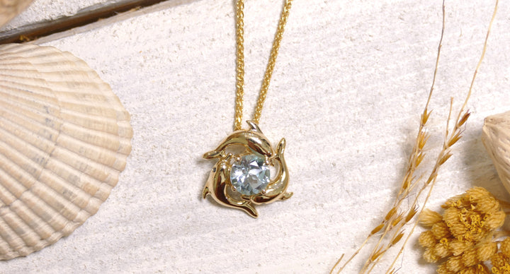 14k - Yellow Gold Triple Dolphin Blue Topaz Pendant