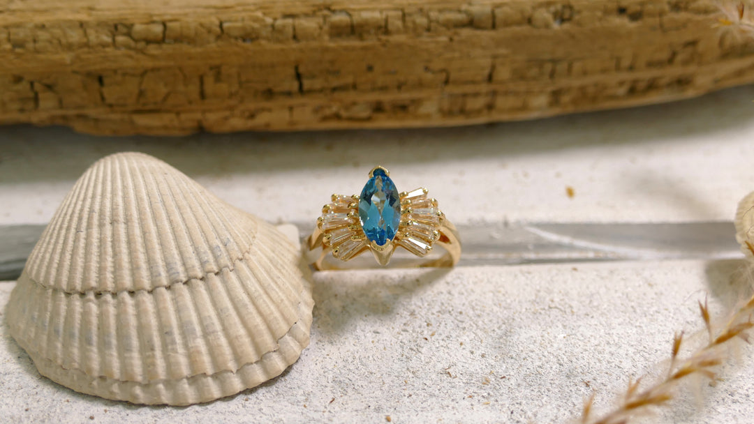 14k Yellow Gold Blue Topaz Ballerina with 10 Baguette Diamonds Ring