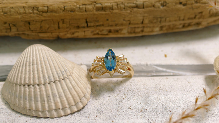 14k Yellow Gold Blue Topaz Ballerina with 10 Baguette Diamonds Ring