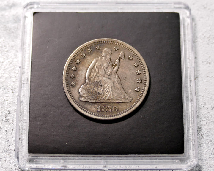 United States 1876-S Seated Liberty Quarter AU 50