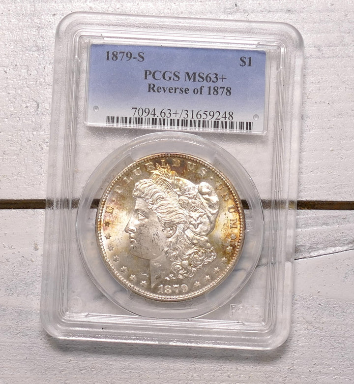 US 1879 REVERSE OF A 1878 MORGAN DOLLAR S MINT MS63+
