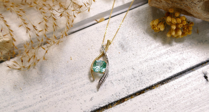 14k Two Tone 2.7ct Caribbean Topaz Cushion Pendant