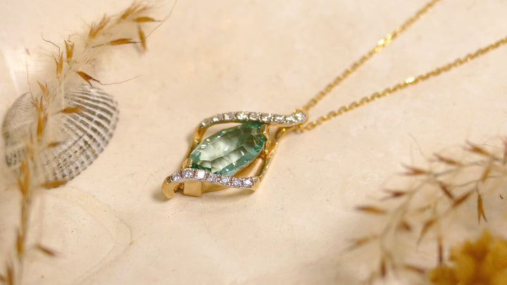 14k Yellow Gold 0.15ct Accent Diamonds Caribbean Topaz Marquise Pendant