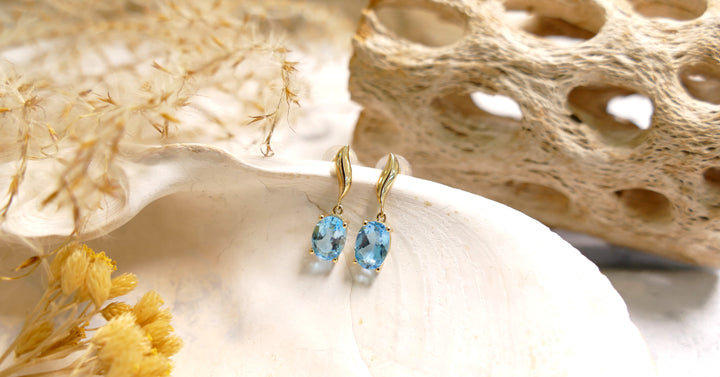 14k Yellow Gold Oval 1.8ct Blue Topaz Dangle Earrings