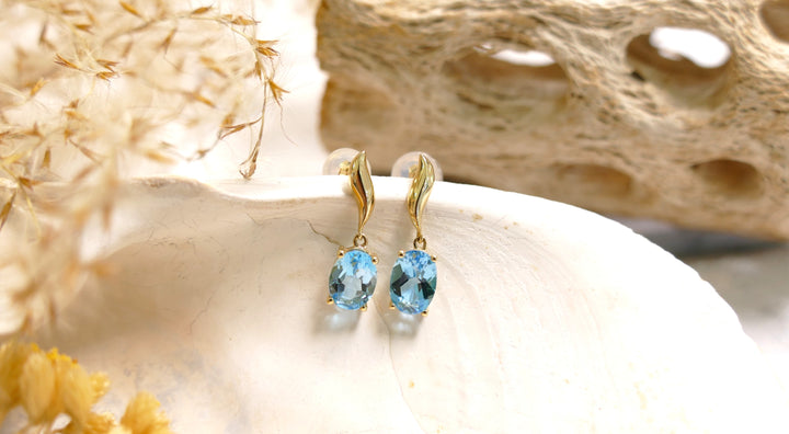 14k Yellow Gold Oval 1.8ct Blue Topaz Dangle Earrings
