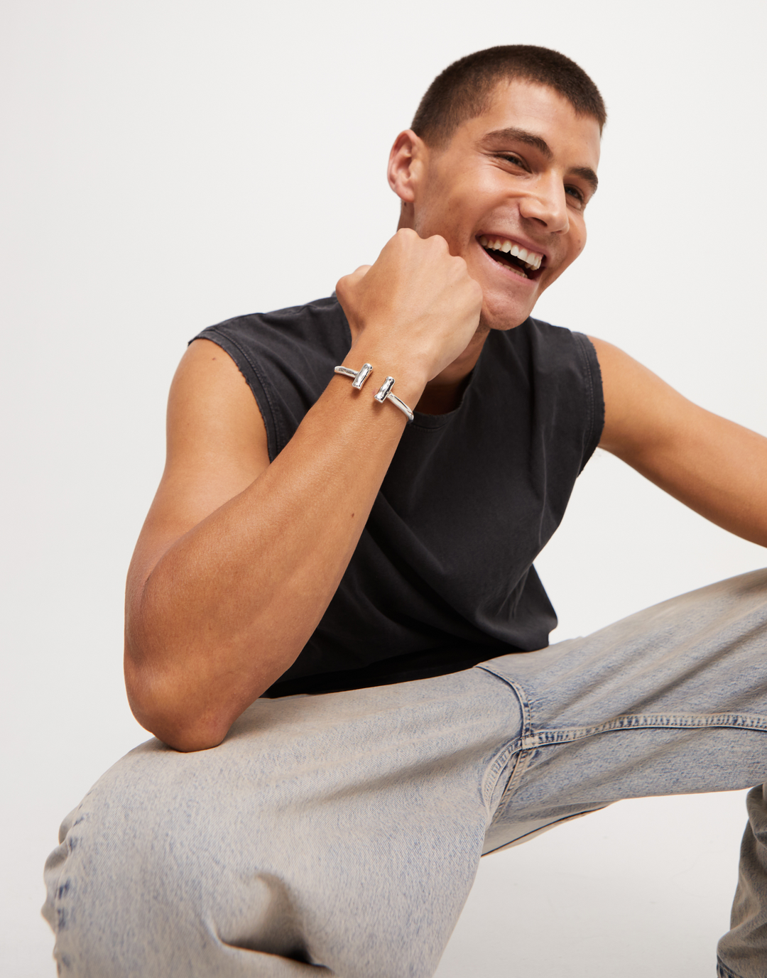 Rigid sterling silver-plated bracelet with two tubes at the ends