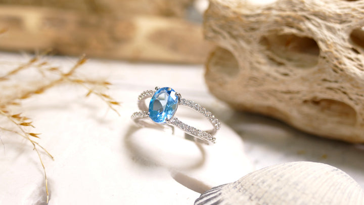 Sterling Silver - Silver CZ - Double Band Oval Blue Topaz Ring (Size 7)