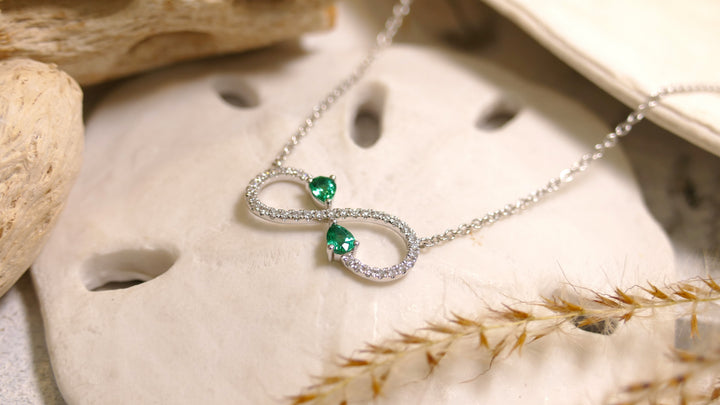 14k White Gold Emerald Accents 0.29ct Infinity .17ct Diamond