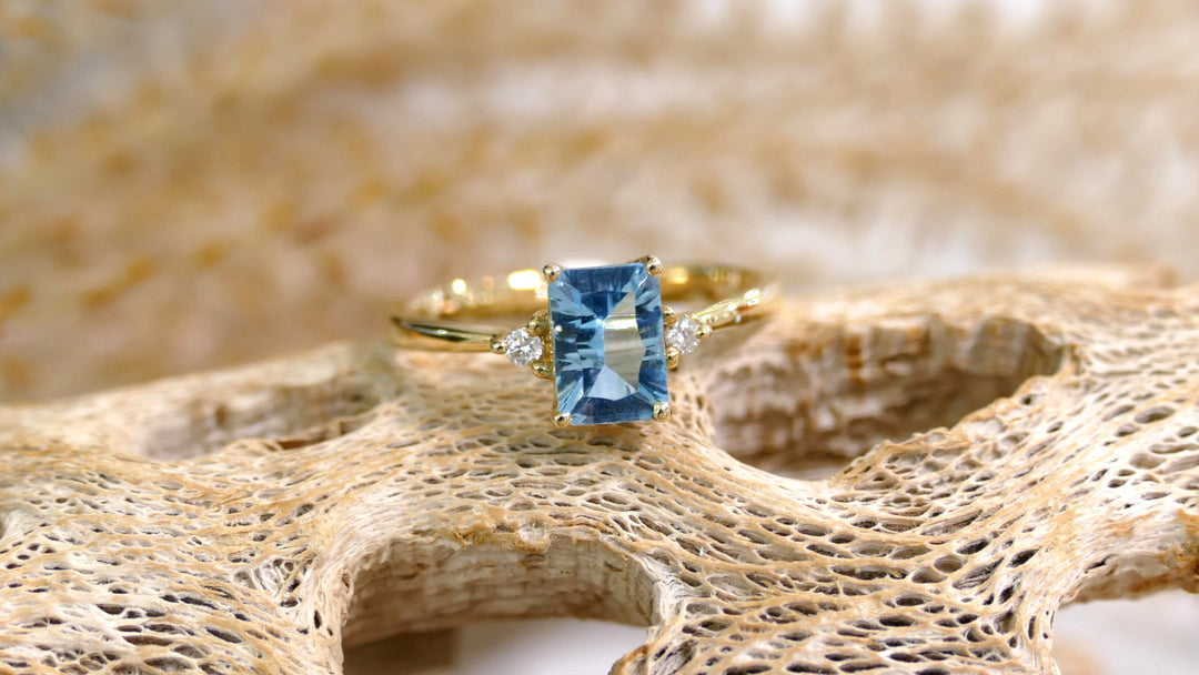 14k Yellow Gold Blue Topaz Emerald Cut Ring (Size 7)