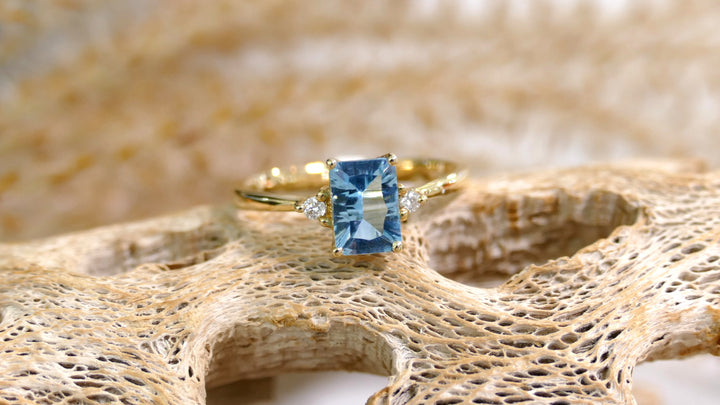 14k Yellow Gold Blue Topaz Emerald Cut Ring (Size 7)